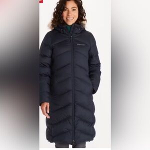 Down winter coat by Marmot. 770 fill down. XS knee length great condition. Blue